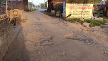 The bridge, built in 12 years, remains unconnected to the highway even after eight years; vehicles are passing through a dilapidated road.