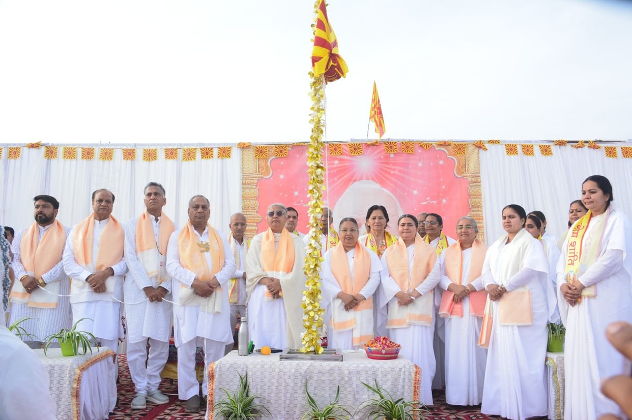 Shiva's flag hoisted at Om Shanti Sarovar