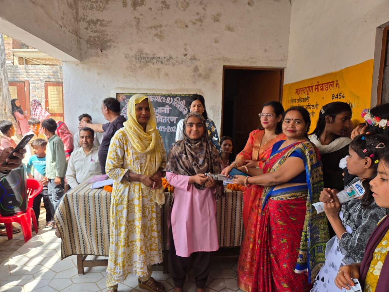 Welcomed the children with Tilak and distributed books.