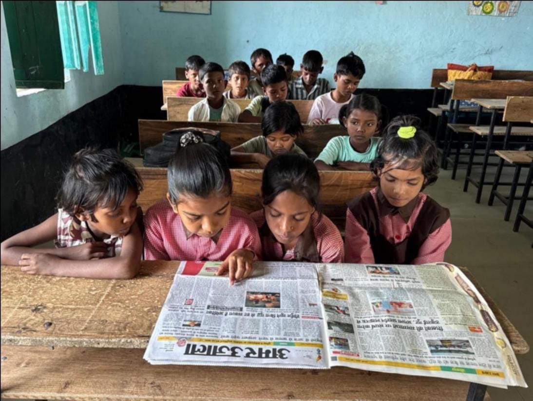 Newspapers are read along with books in schools