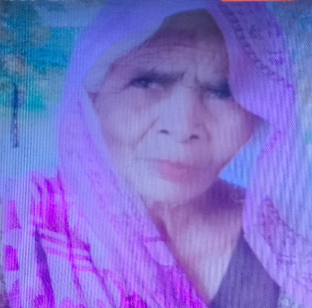 An elderly woman fell from a roof during a storm and died.