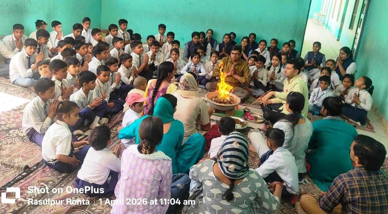 Students were welcomed with tilak and flowers.