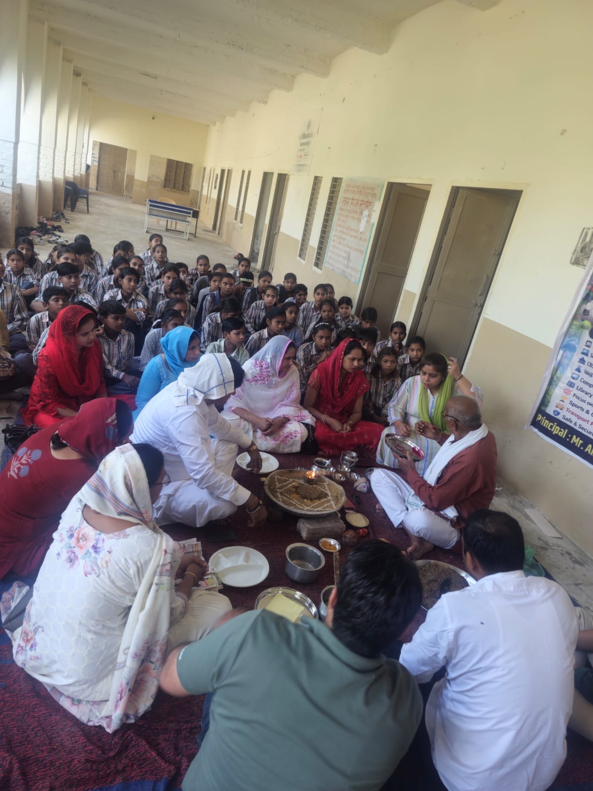 Greeted the students by applying tilak