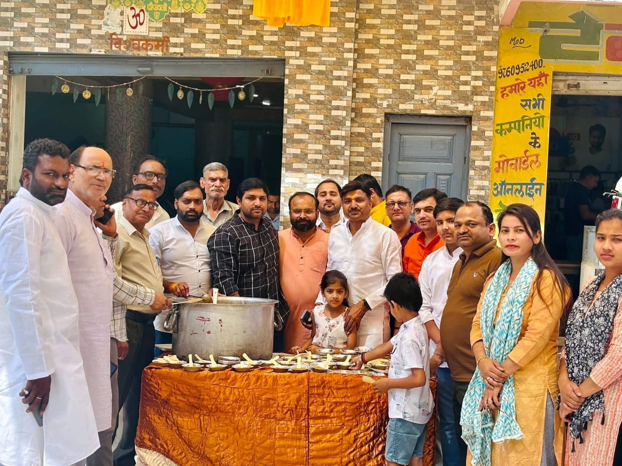 Worshiped Hanuman and distributed Prasad.