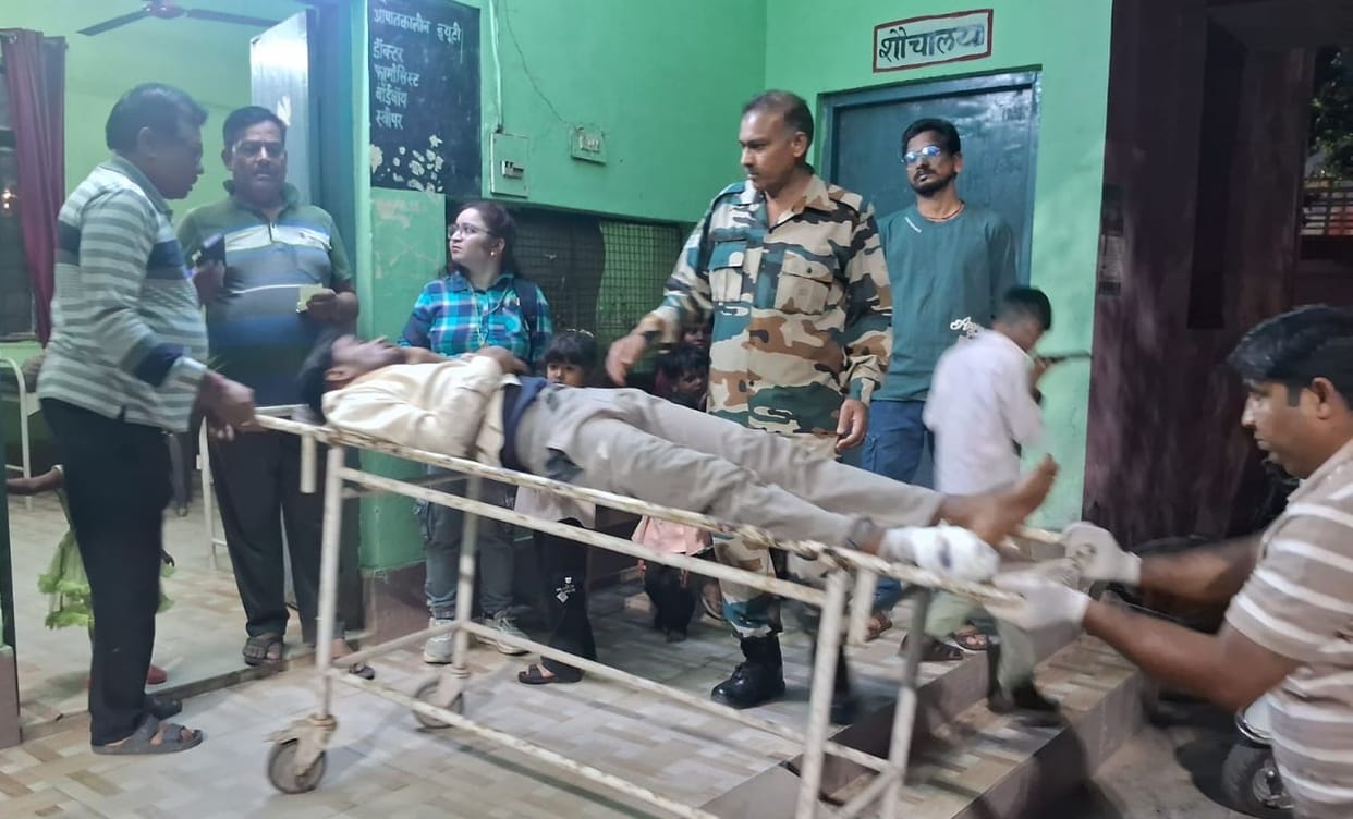 Auto-rickshaw fleeing after hitting bike overturns; nine injured.