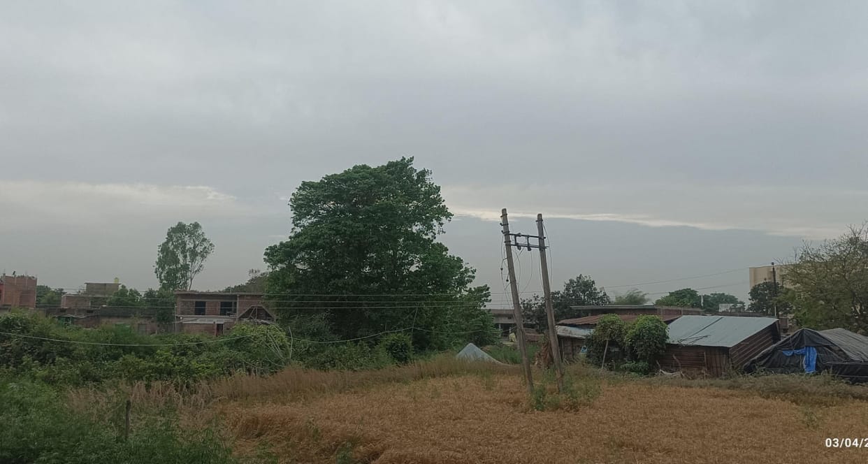 The gathering of clouds increased the worries of the farmers.