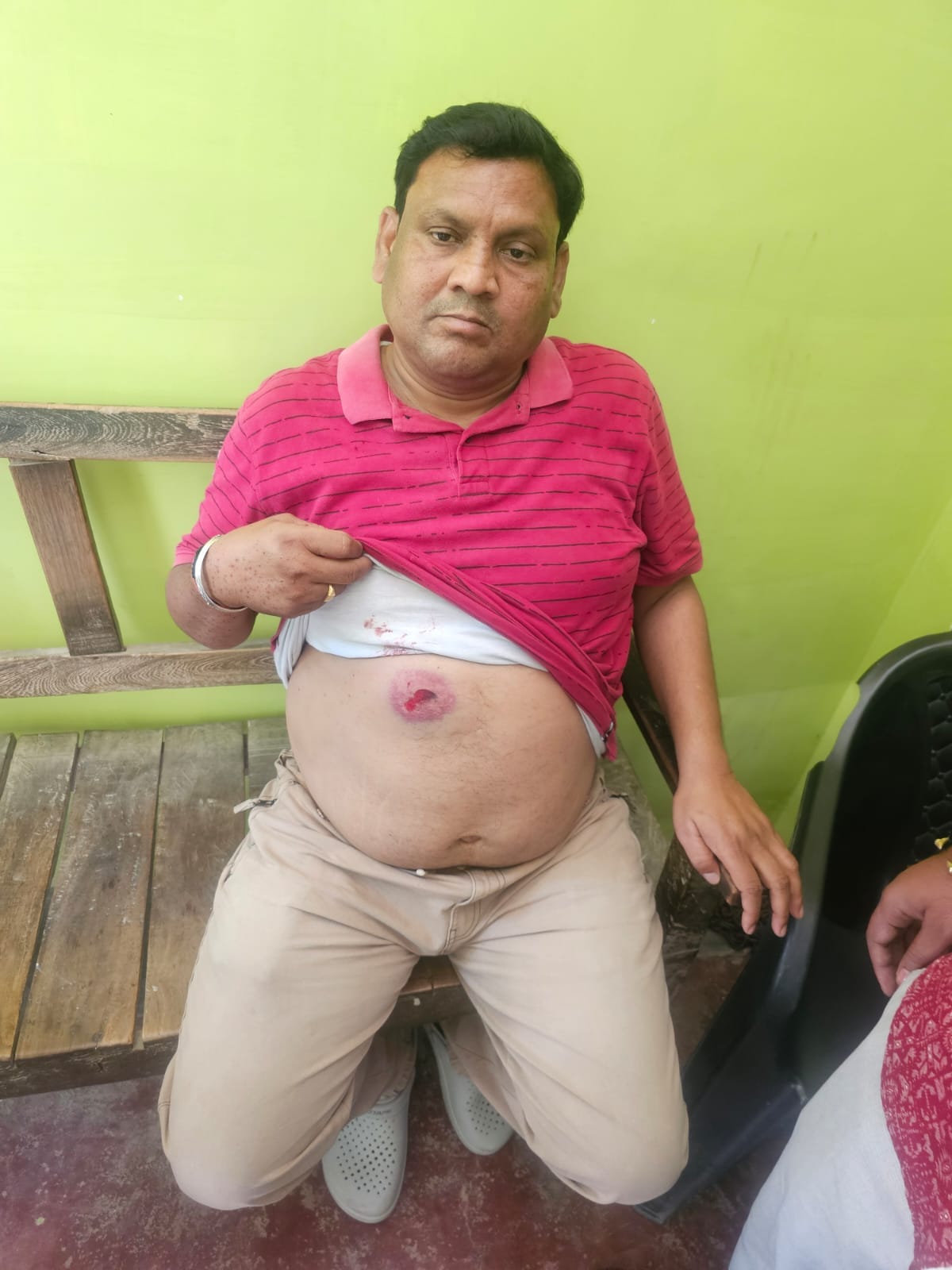 The principal was shot in the stomach after entering the school