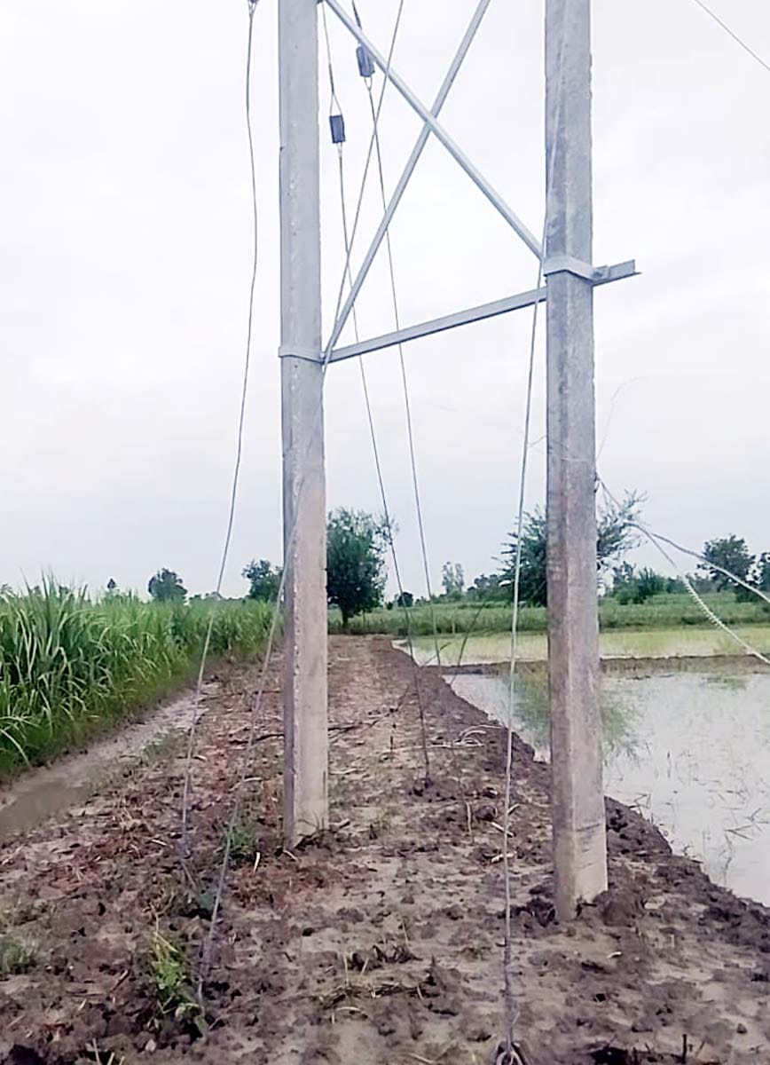 Poles erected right in the middle of the access path... Farmer left wandering in an effort to have them removed.
