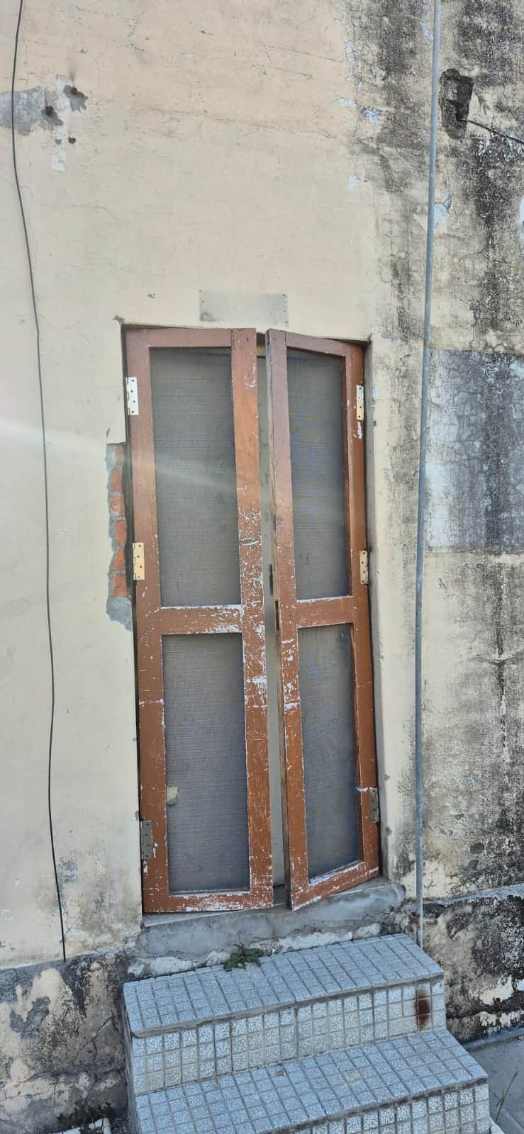 सिविल अस्पताल बड़सर में ओपीडी के बाहर अल्ट्रासाउंड रूम के बंद दरवाजे। संवाद