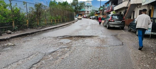A deep pit outside the Shiva temple at Baijnath has become a threat to life.