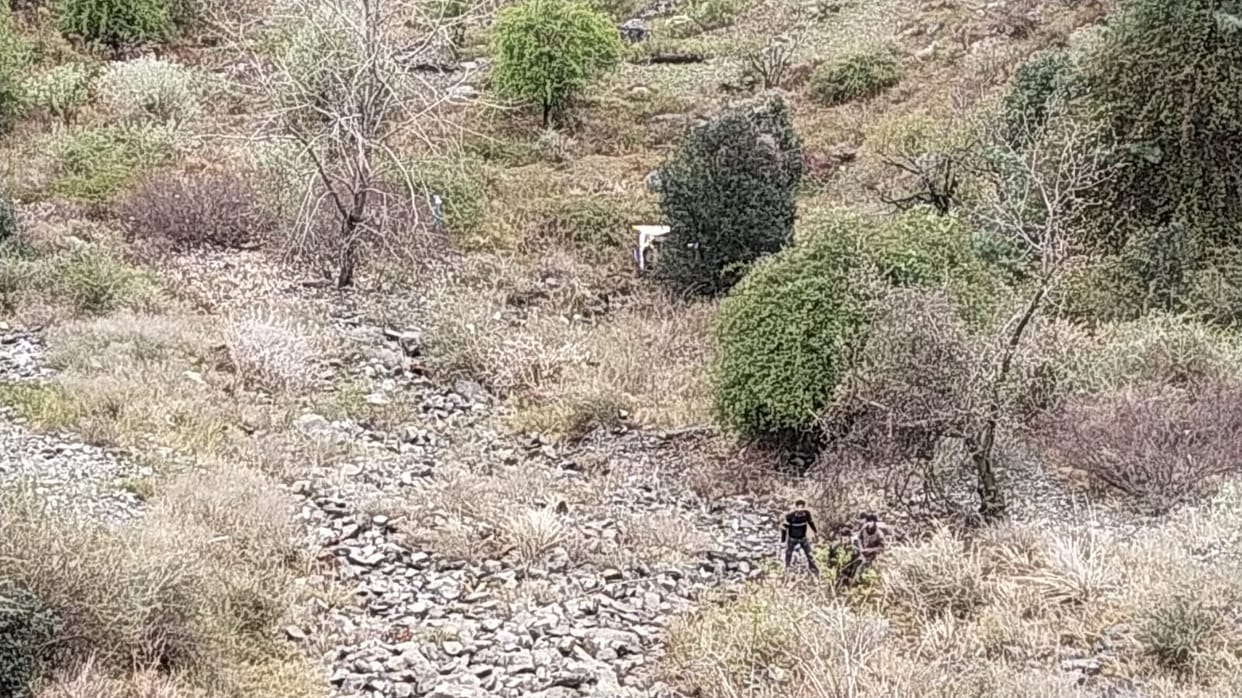 One person died as a pickup truck fell into a ditch after a road embankment collapsed.