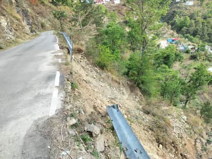 The broken road wall has become a trouble for Mandra village.