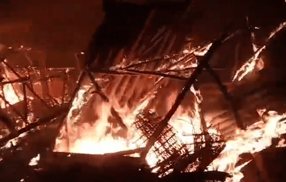 A massive fire engulfed two homes. Household