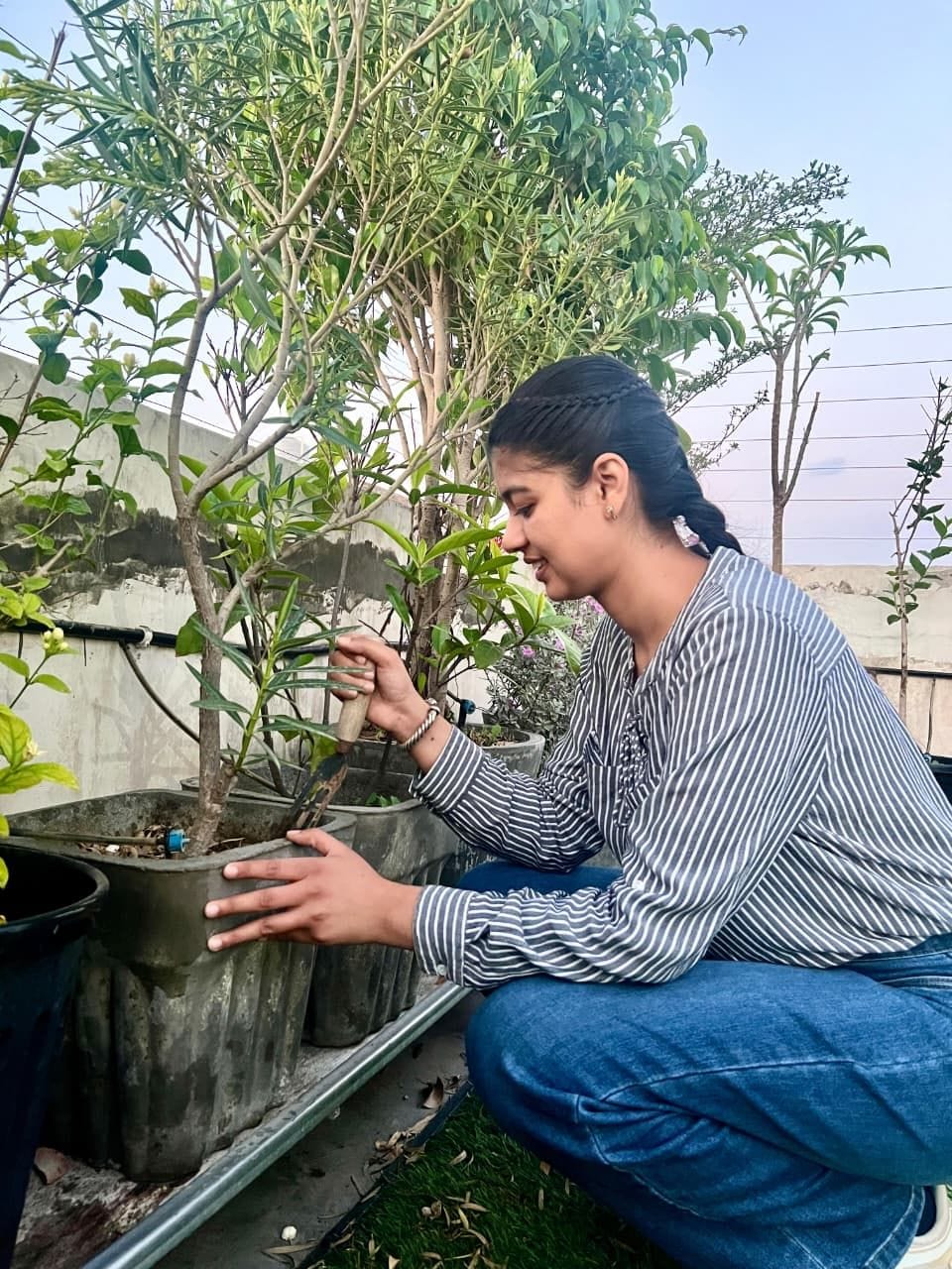 Sneha has created a medicinal garden at home and tends to the plants herself.