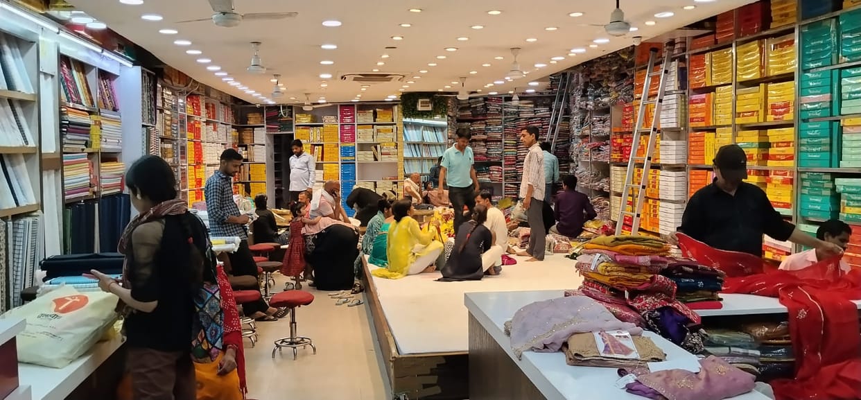 The market is bustling with activity ahead of the wedding season, with demand for lehengas and sarees on the rise.