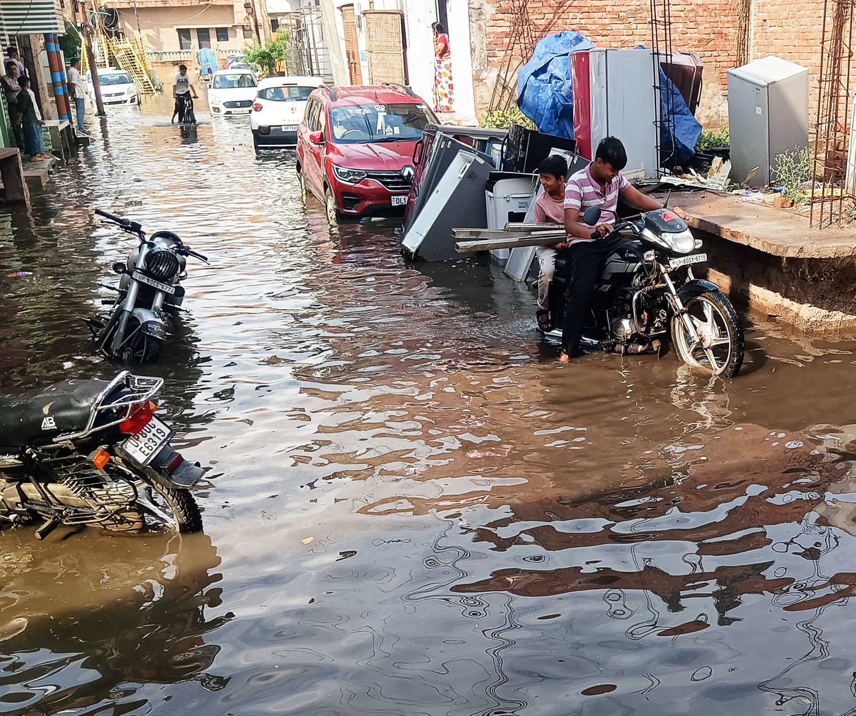 Half an hour of rain exposed the lack of proper sewer cleaning, flooded streets resembled pools, water filled up the doorsteps of homes, and people were in distress.