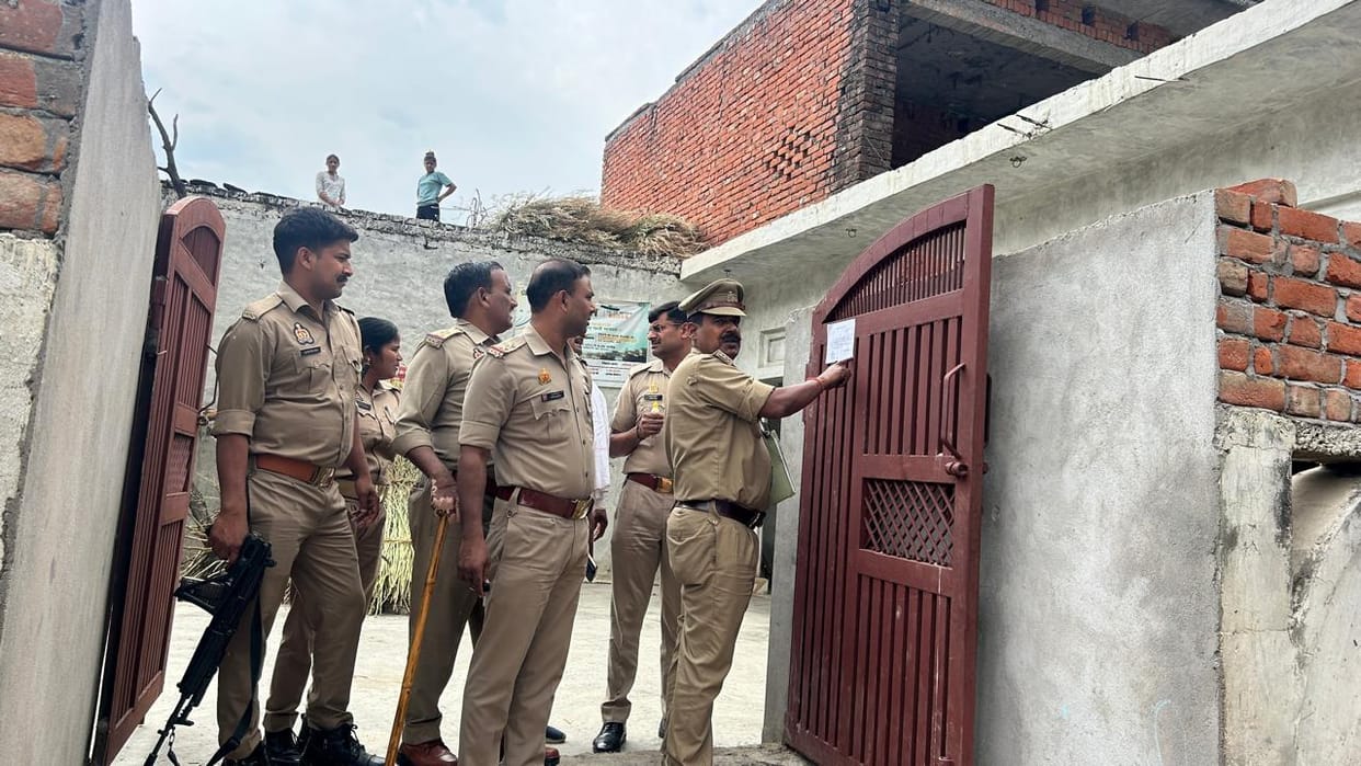 Seizure notice pasted on the houses of five accused