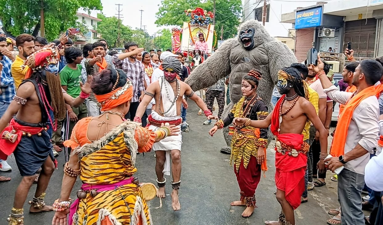 A procession was taken out with bands and floats.