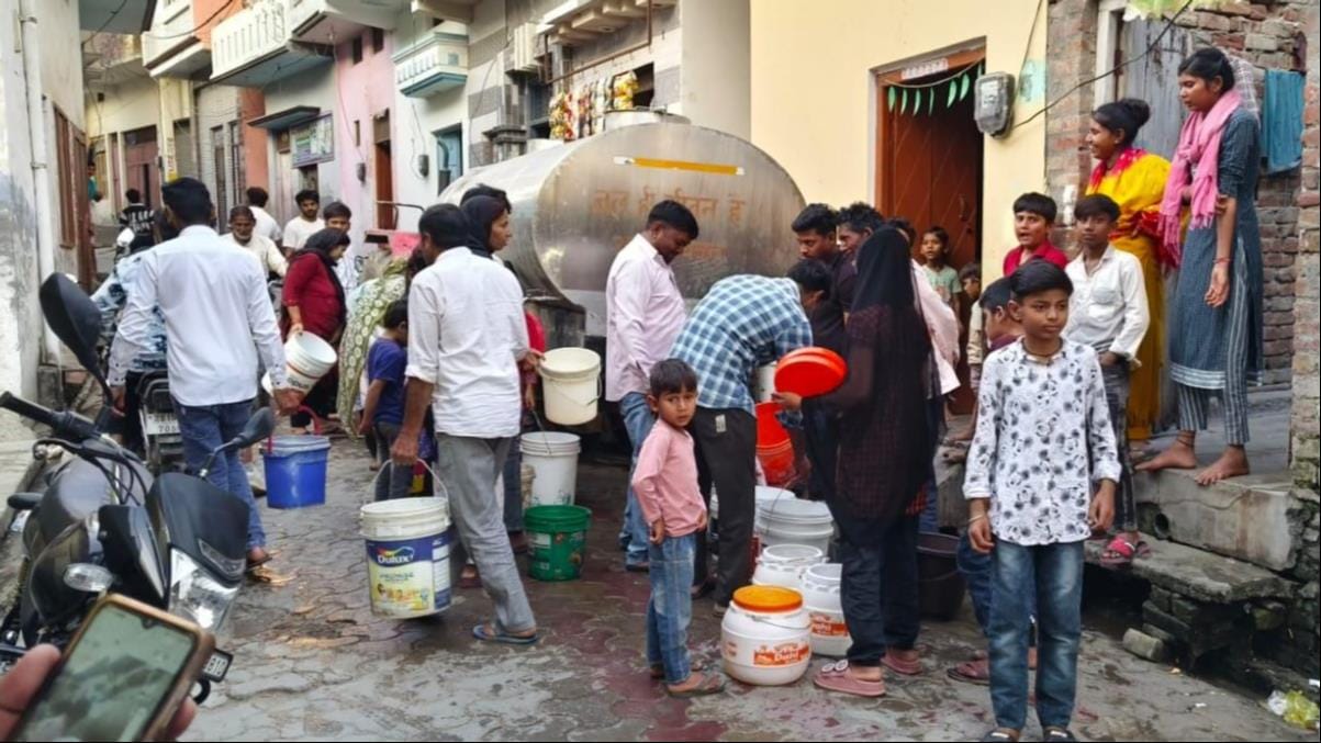 Drinking water supply has been disrupted for four days, with crowds gathering to collect water from tankers.