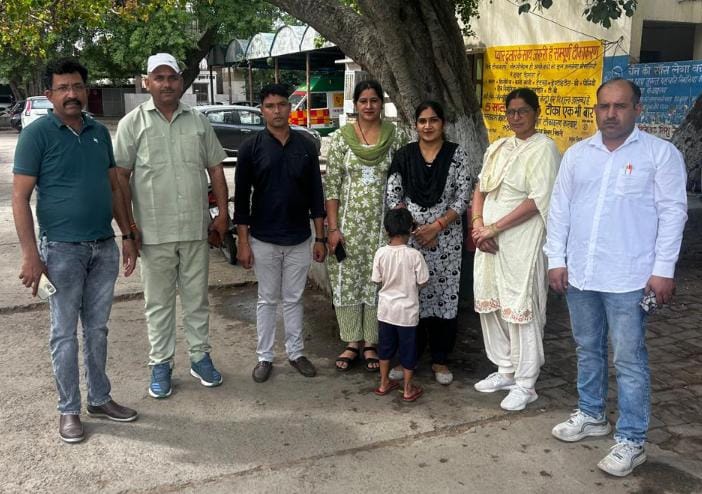 A five-year-old boy was rescued from a police officer's home, and the case is suspected to be linked to child trafficking.