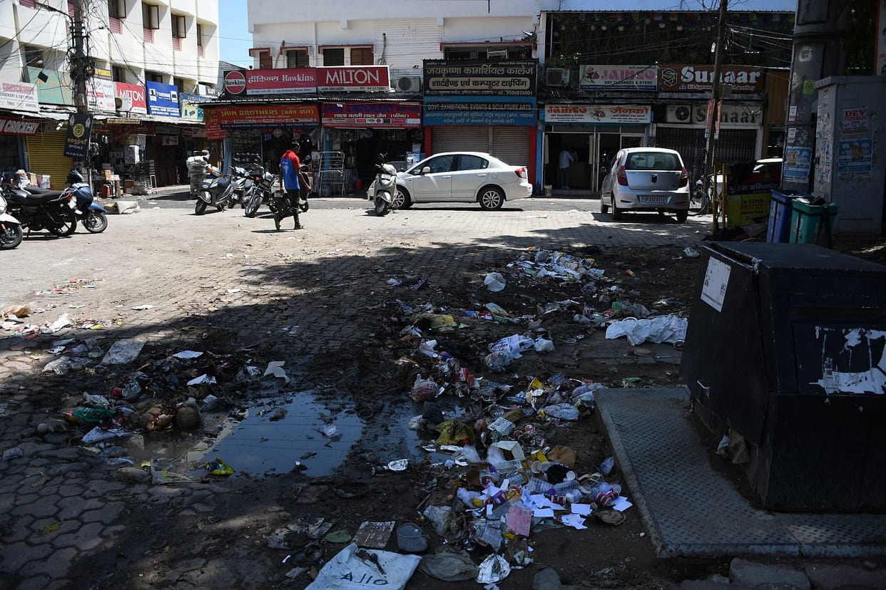 The city's sanitation system is in shambles, with garbage rotting on the streets.