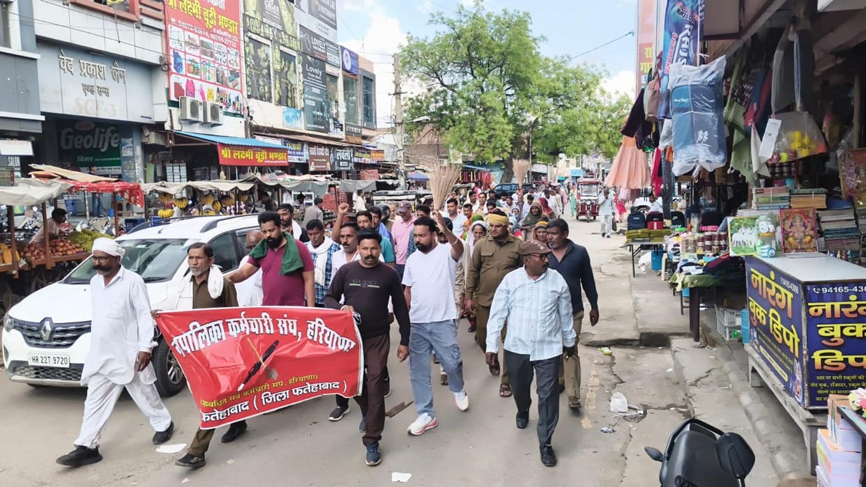 Municipal council workers staged a protest on the second day by sweeping the streets