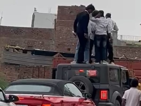 Performing Stunts on Car Roof; Video Goes Viral