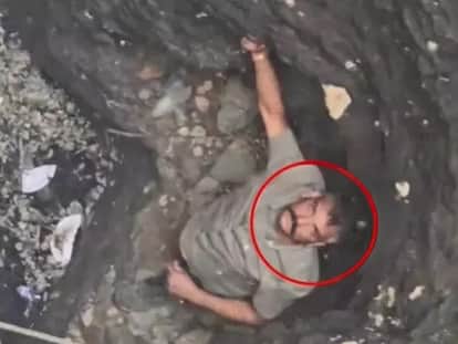 Leopard trapped in a 70-foot-deep well, safe rescue: Ranger risked his life to tranquilize it.