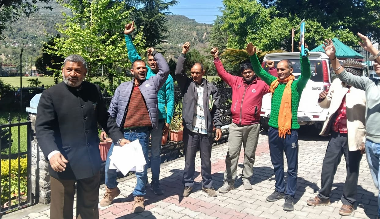 Residents of Bhodas stage a protest outside the DC office.
