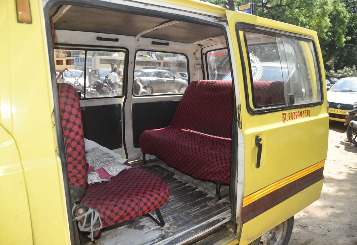 13 to 16 children were seated in a school van, the window grill was missing.