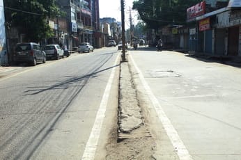 Traders sat dejected outside sealed shops, staff arrived without tiffin.