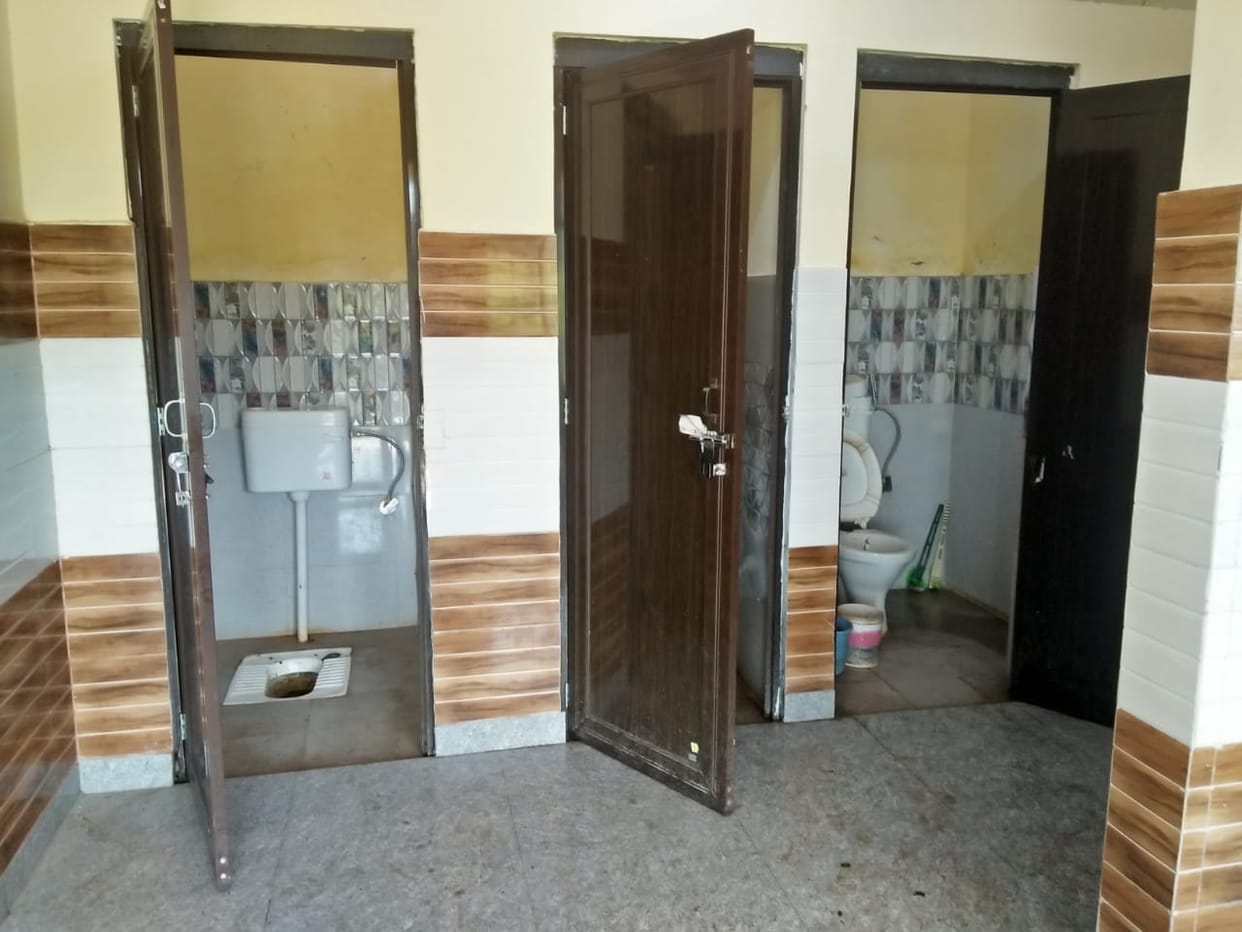 Devotees are troubled by the poor condition of toilets and are forced to go in the open.