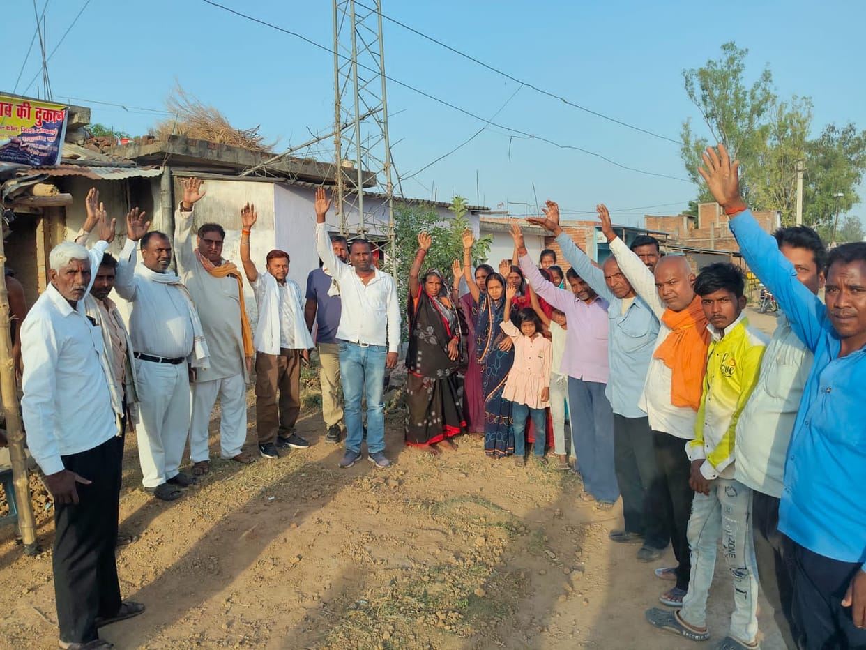 Villagers protest against the opening of a liquor shop.