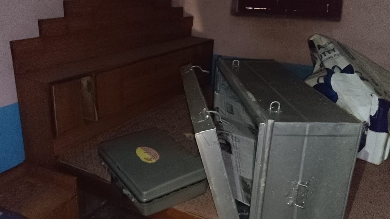 Jewellery, cash and grains stolen by breaking the lock, another lock was locked from outside