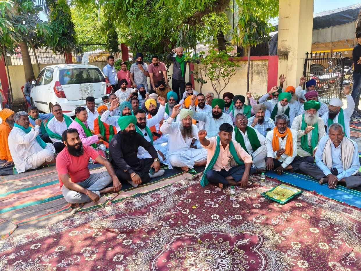 Protest was held by staging a sit-in protest against the indecent behavior of the CO and non-purchase of wheat.