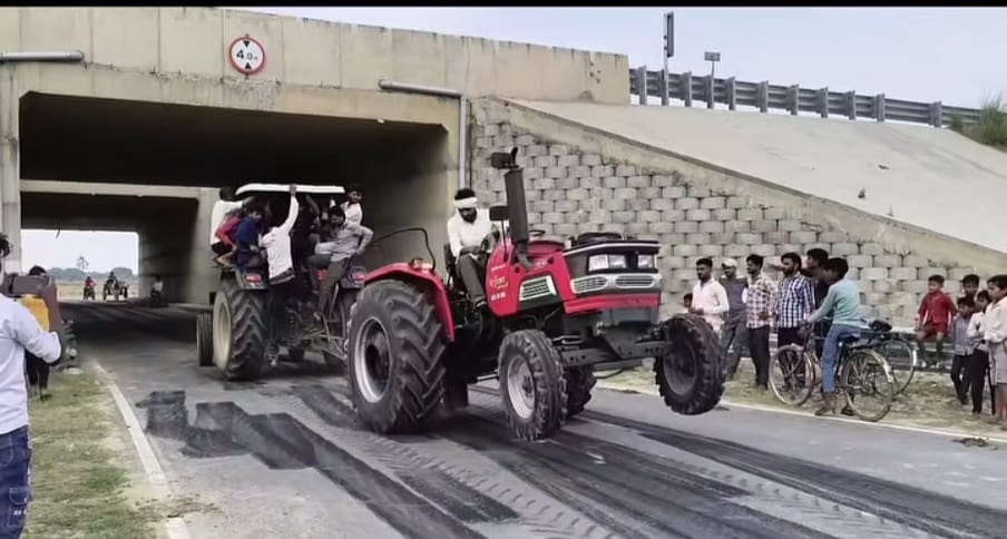 Tractors Engaged in a Tug-of-War, Chained Together Inside an Underpass