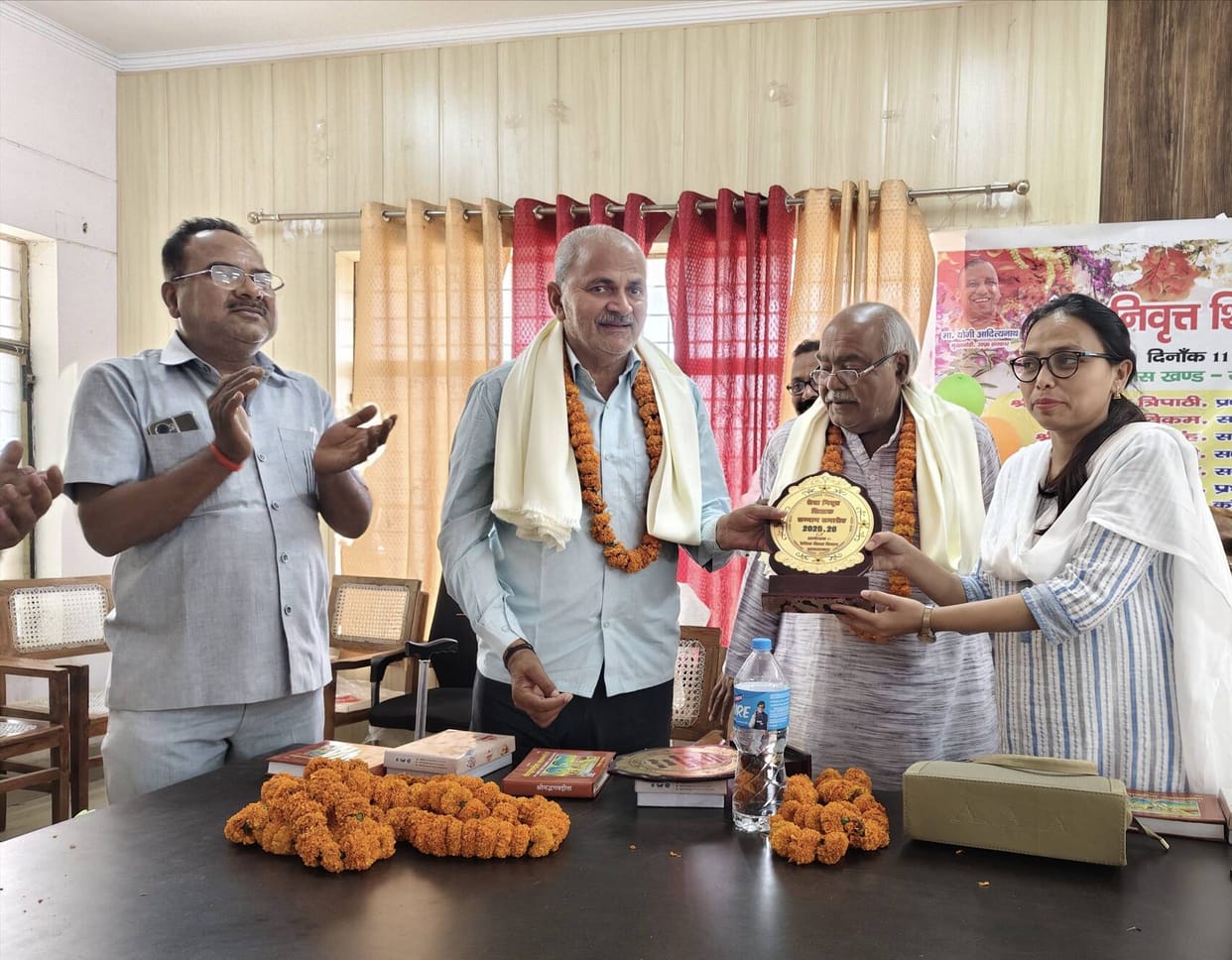 Retired teachers were honored with garments and mementos.