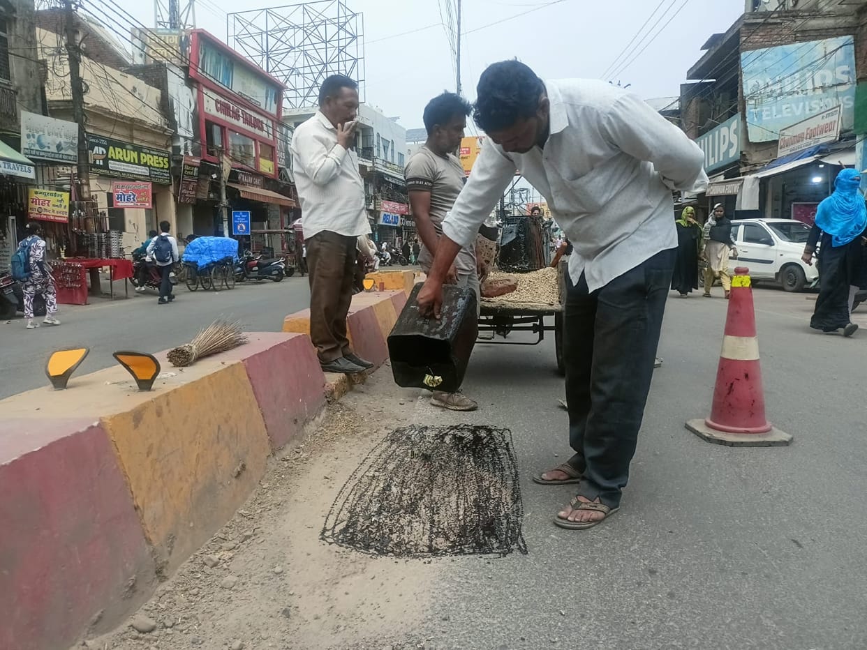 The government is coming, the city is shining... the roads are full of cracks.