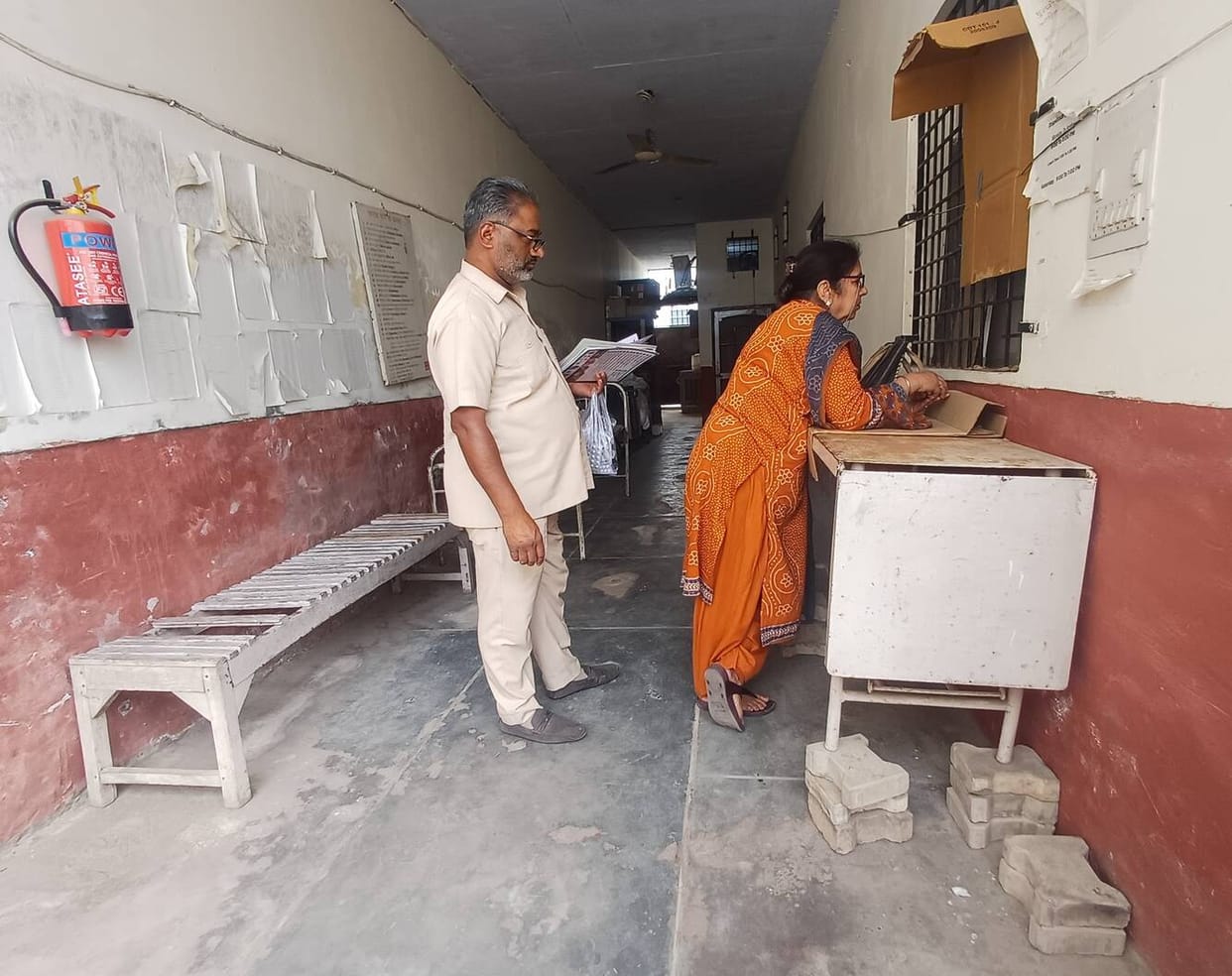 ESI dispensary in bad shape... no board outside, no place to sit inside, cracked walls