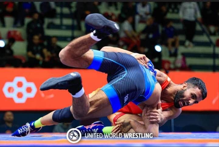 चैंपियनशिप के दौरान दमखम दिखाते हुए पहलवान सुजीत कलकल।