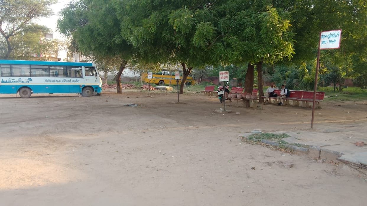 Facilities at the bus stand are incomplete, causing difficulties for passengers.