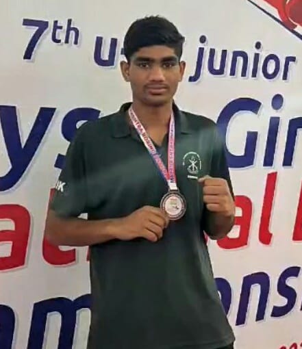Vinay from Buana Lakhu village wins bronze medal in boxing.