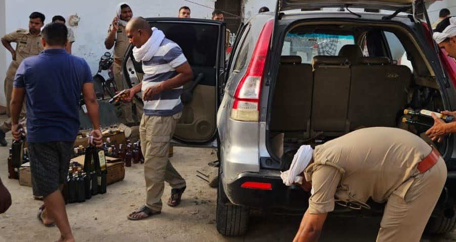 A car loaded with liquor overturned after a tyre burst on the Purvanchal Expressway.