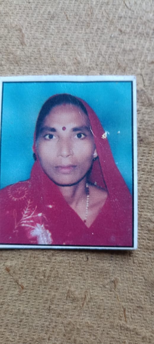 The body of a woman found hanging from a noose, grieving the death of her grandson.