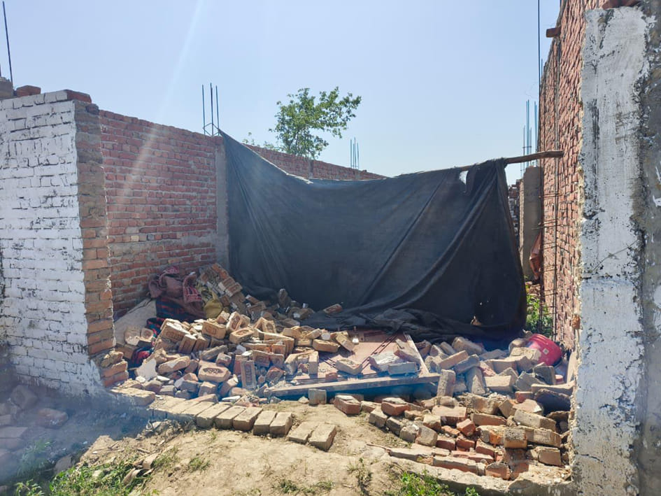 House demolished with JCB, woman injured