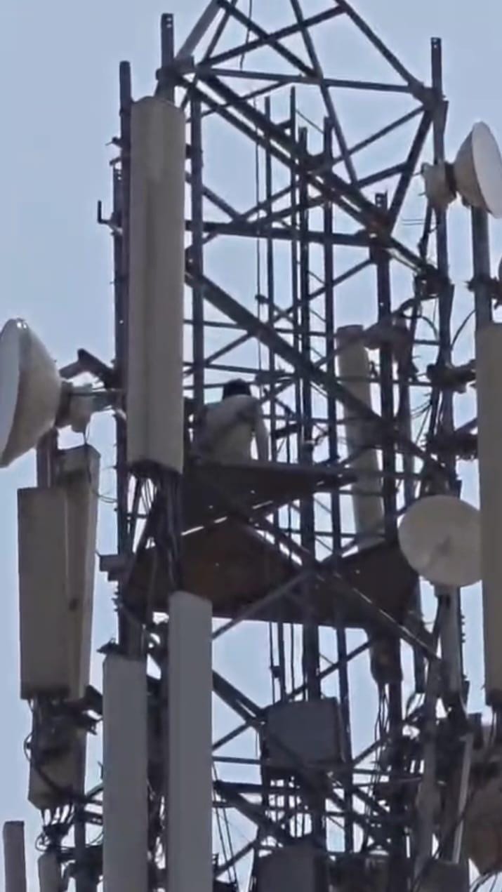 A young man climbed a mobile tower to marry a teenager.