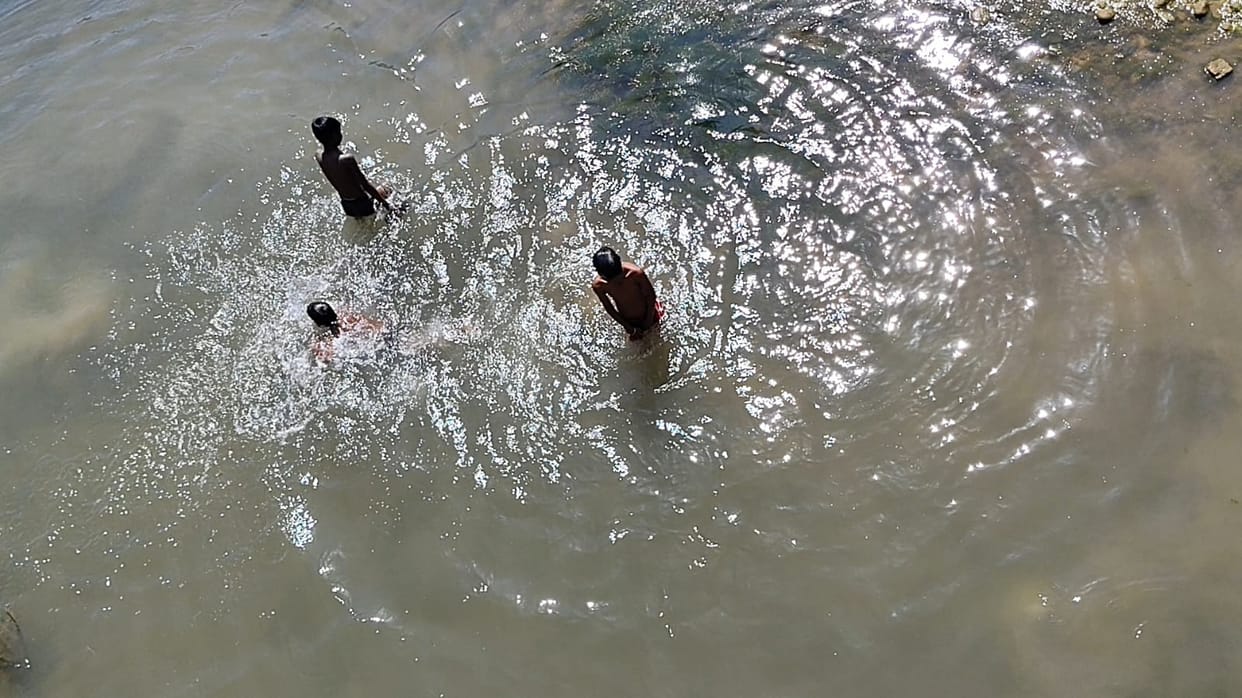 swimming in river