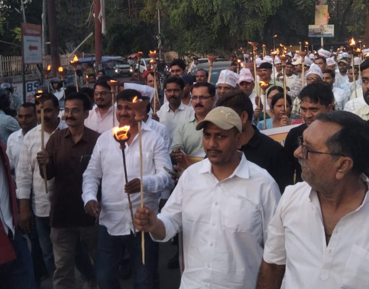 Teachers took out a torchlight procession in protest against the mandatory TET requirement