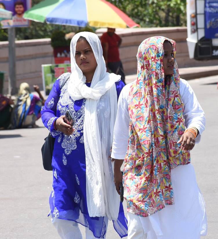 Crowds throng the parks.