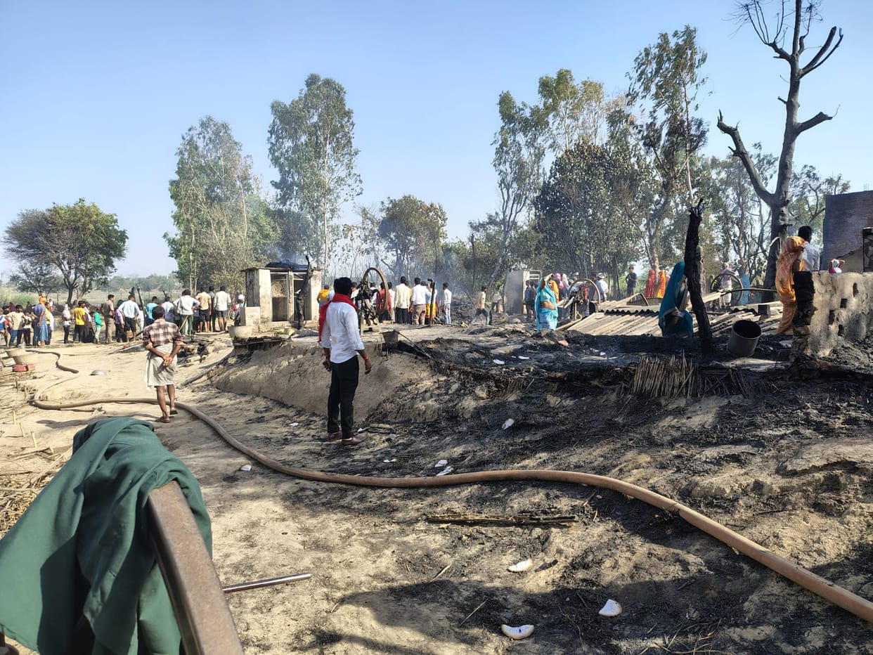 A fire engulfed a thatched roof, burning 50 goats and 14 chickens